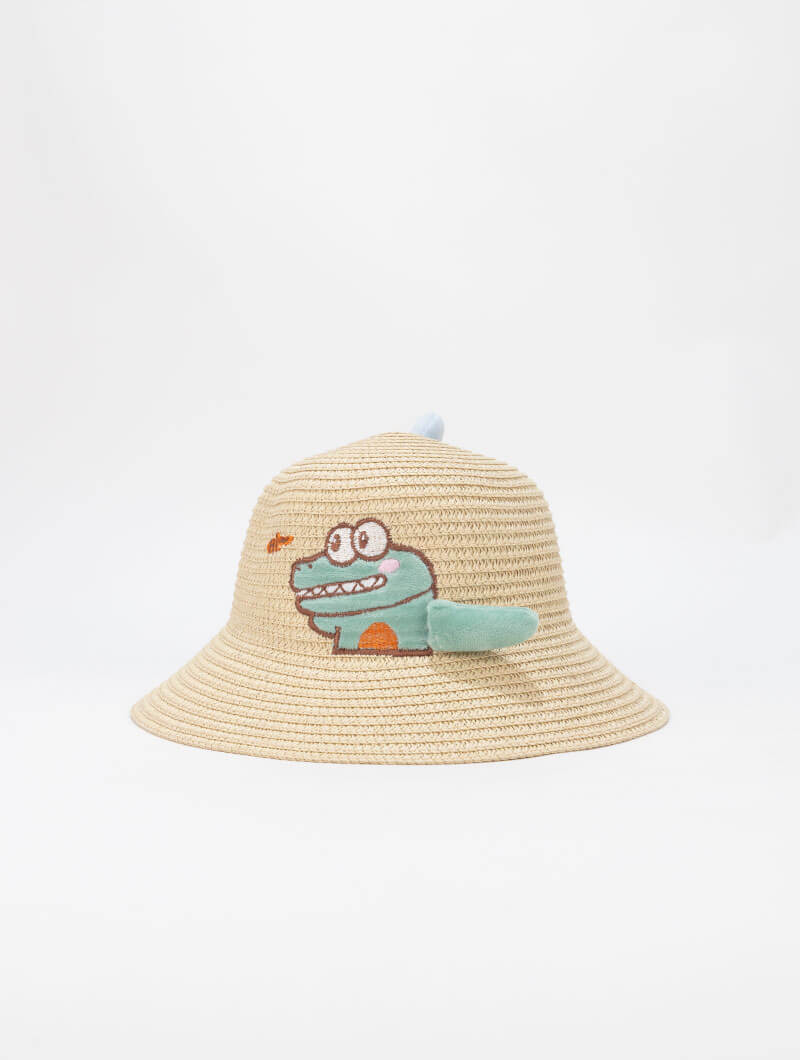 Chapeau en paille avec détails décoratifs